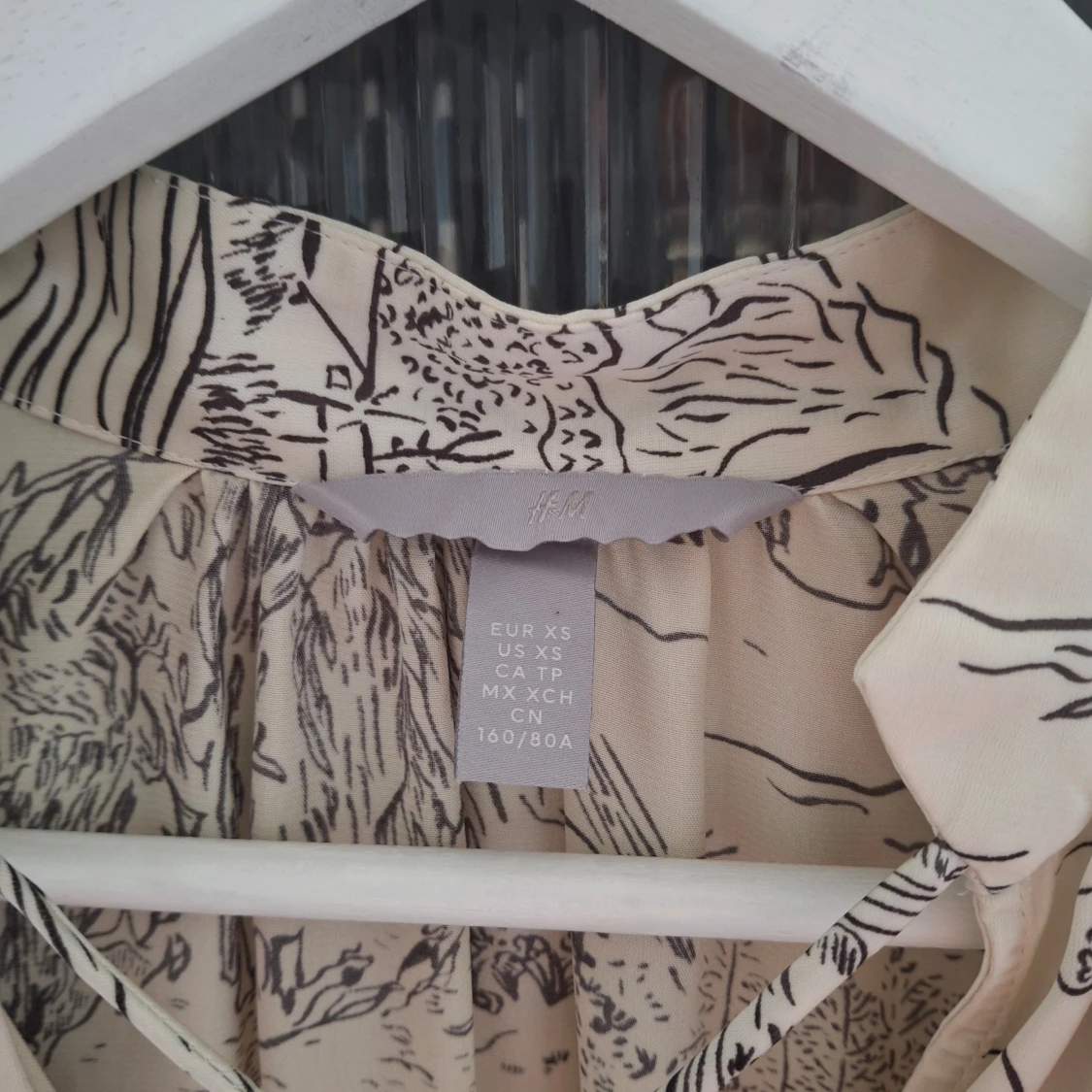 Beige mönstrad klänning från H&M - 92