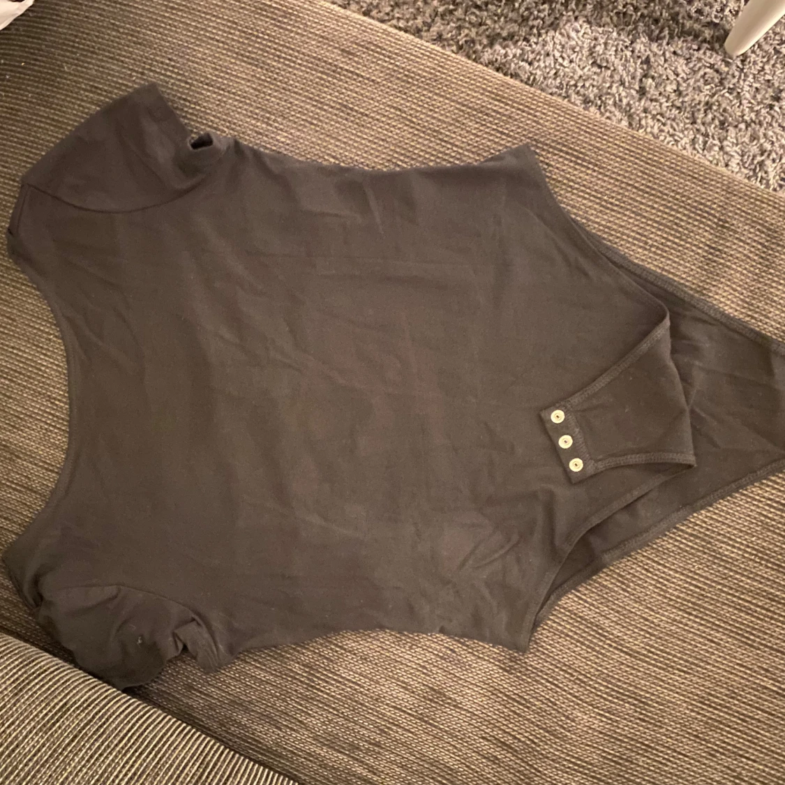 Svart kortärmad bodysuit - 90