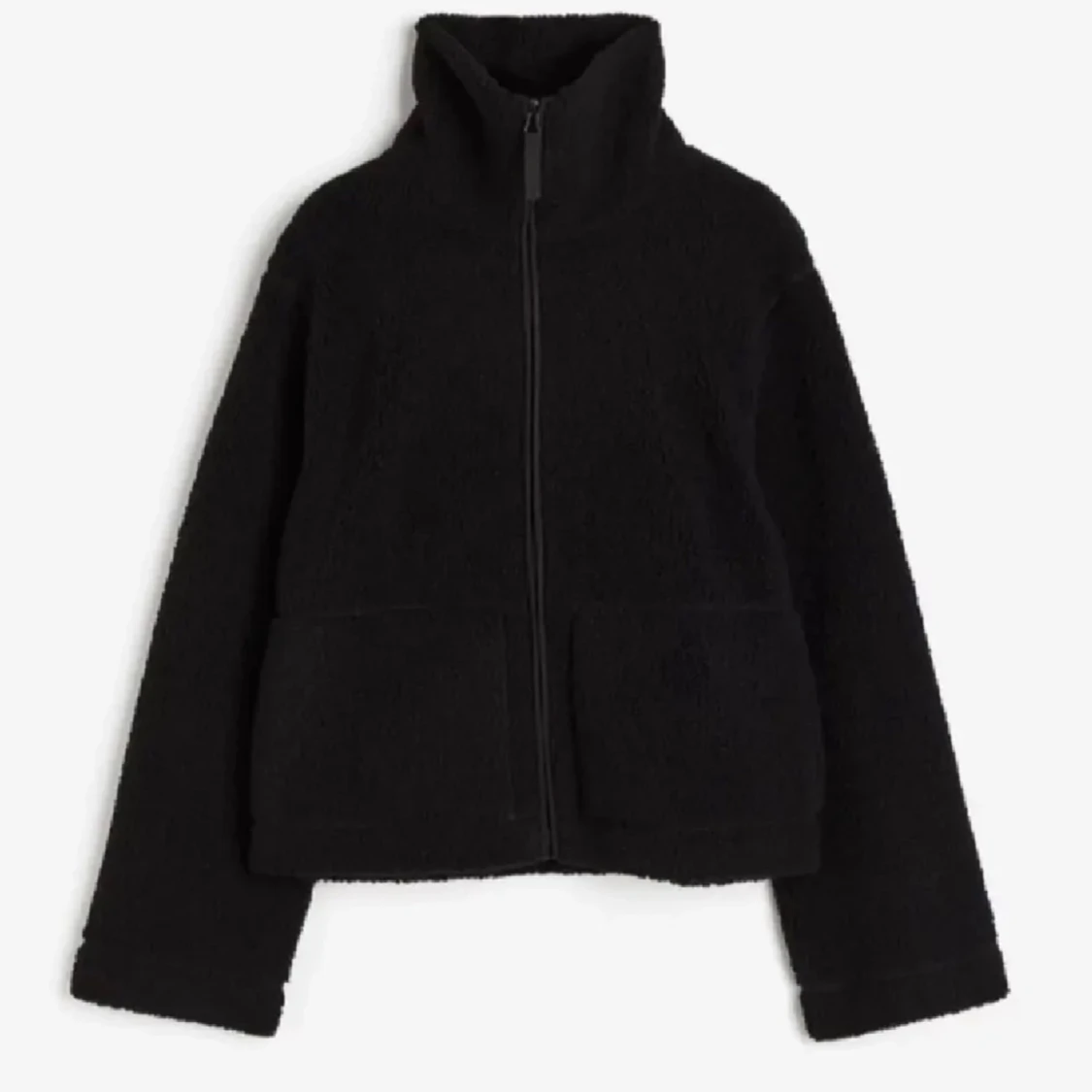 Svart teddyjacka med dragkedja