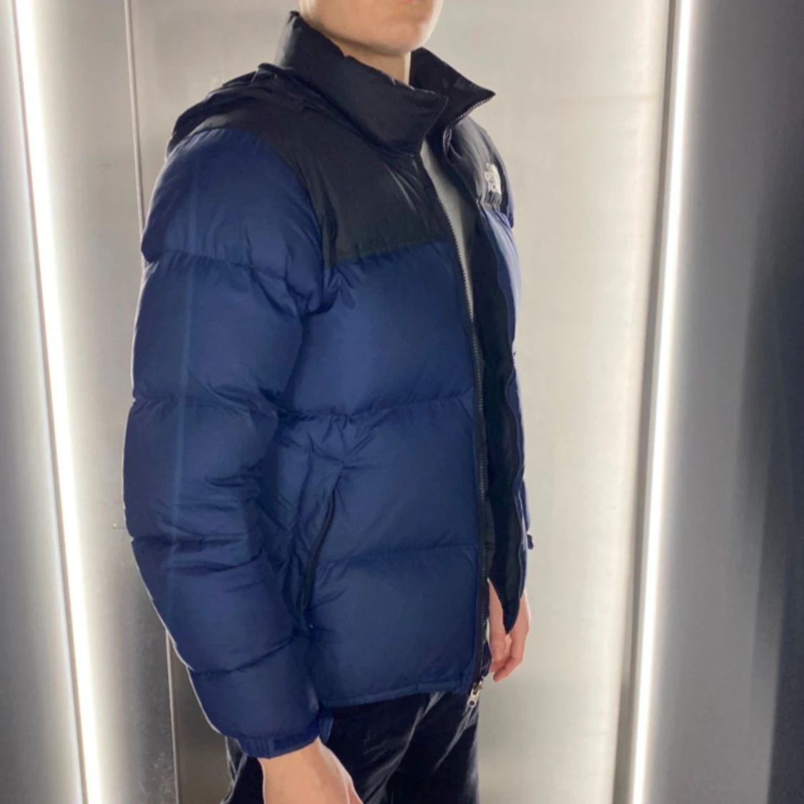 Mörkblå puffar från The North Face - 91