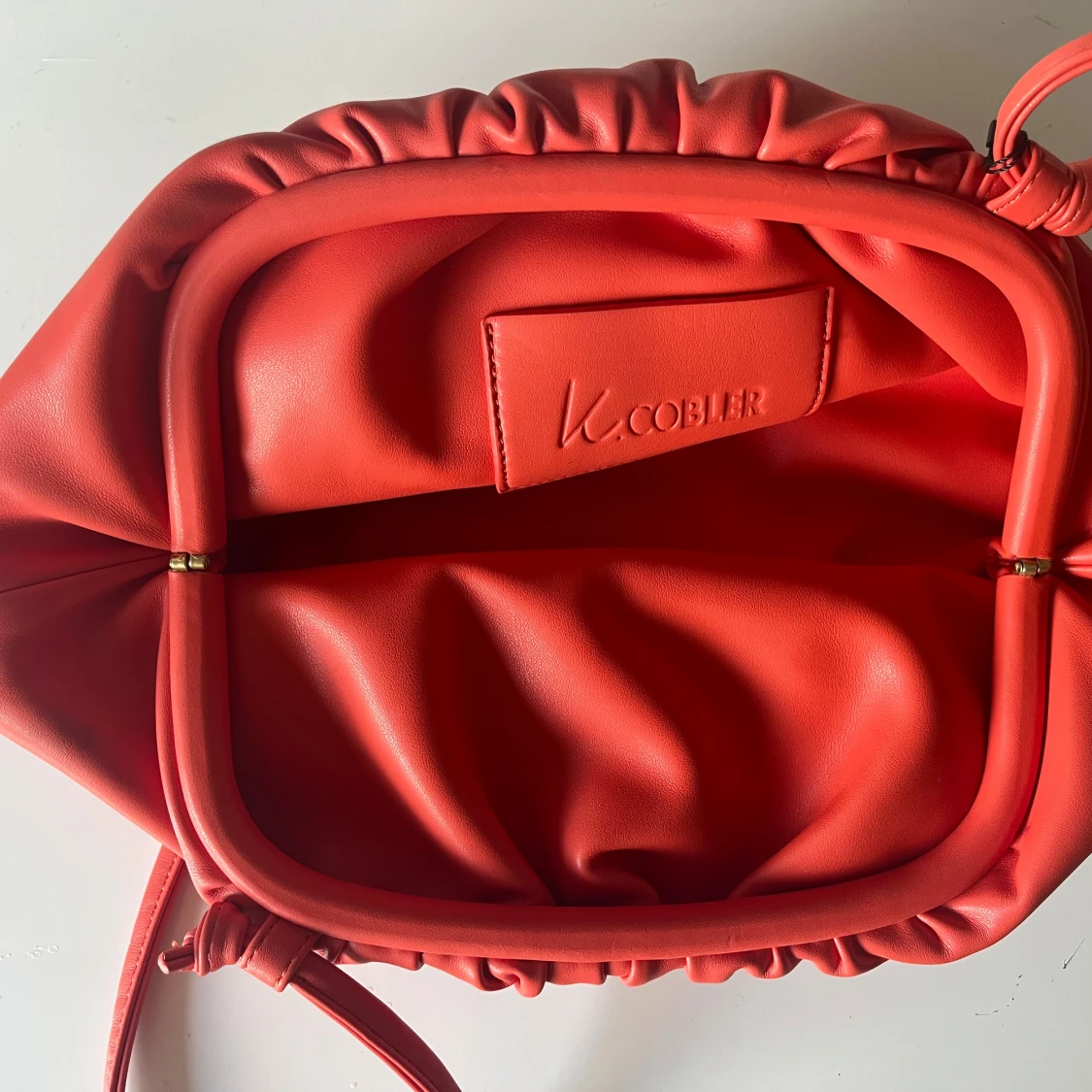 Orange axelväska från K.Cobler - 2
