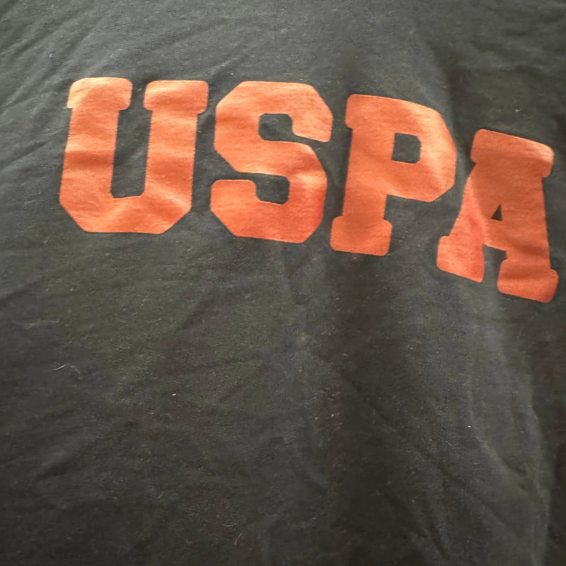 Mörkblå hoodie med USPA-tryck - 1