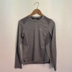 Long sleeve Nike running shirt. Only use a few times. 