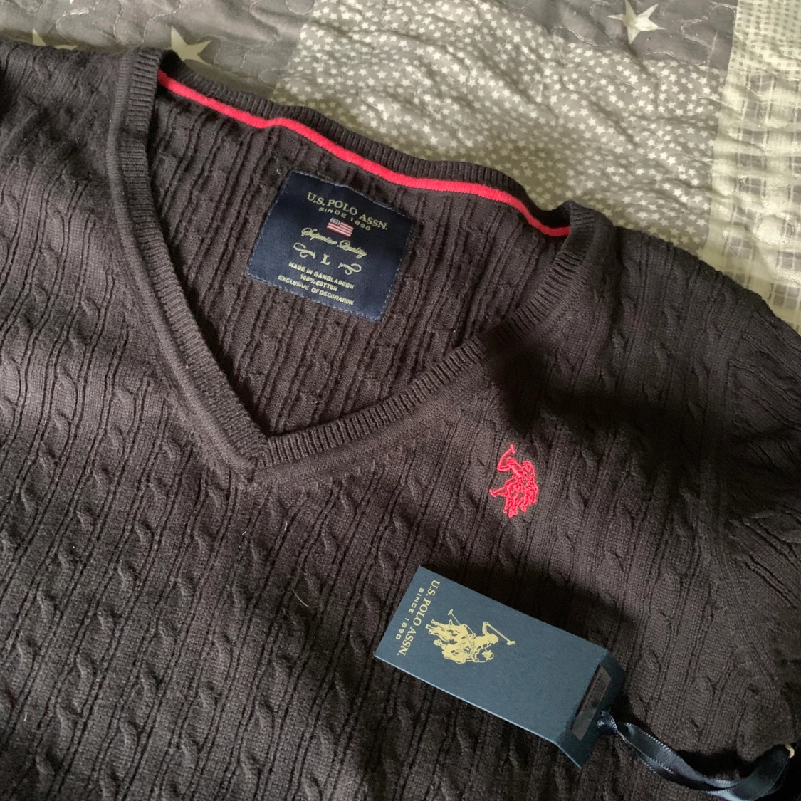 Svart stickad tröja från us polo St L - 90