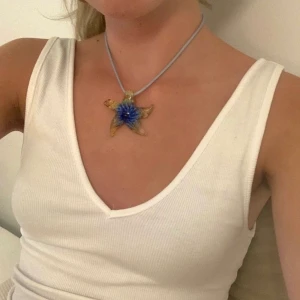 Sjöstjärna halsband - säljer endast berlocken, mörkblå, orange, grön och lila