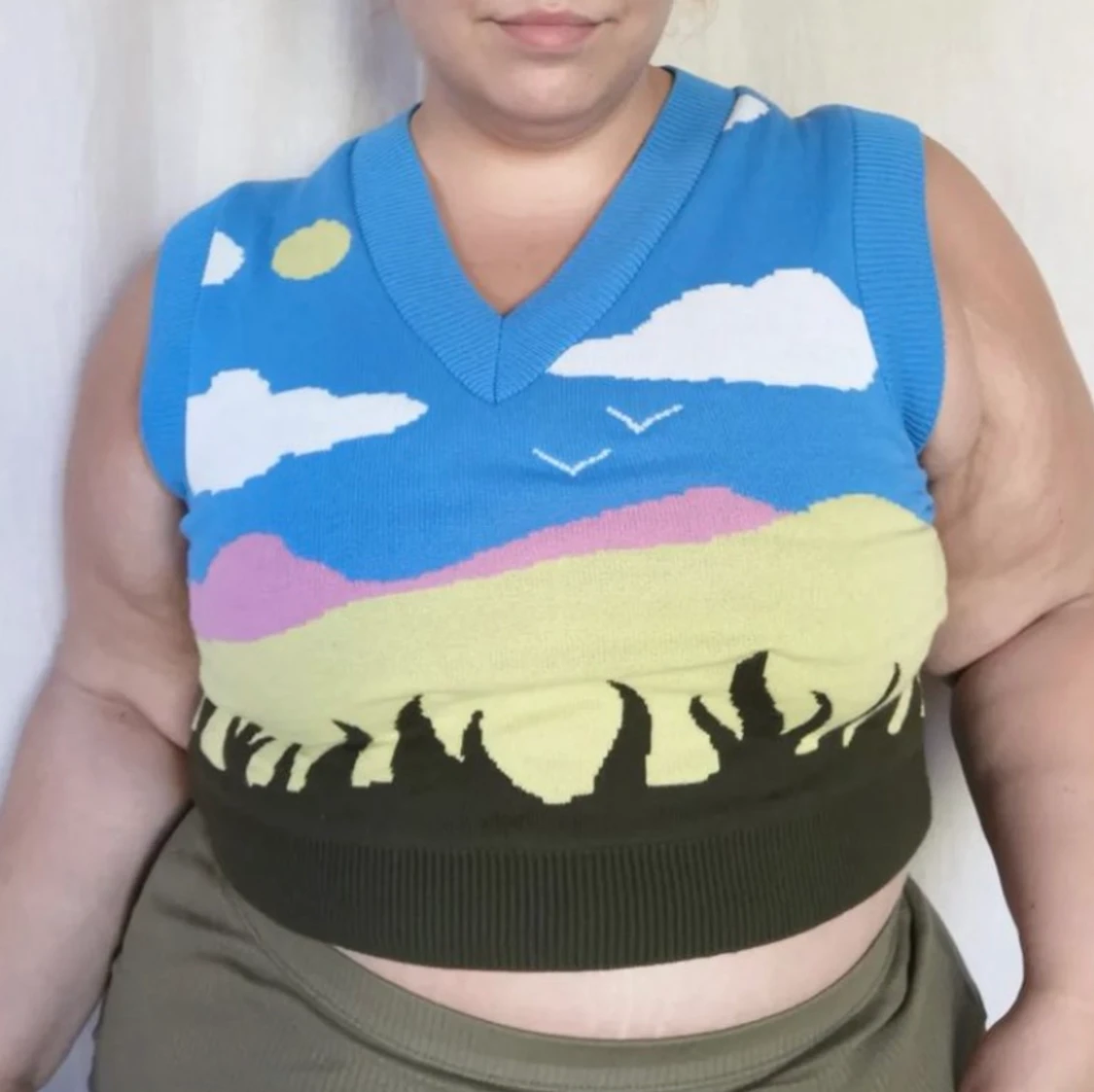 Stickad väst med motiv  - 91