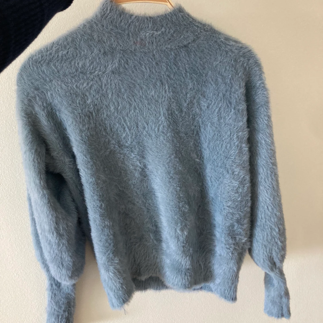 Fluffig tröja designbysi