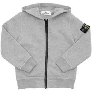 Junior medium, grå stone island hoodie i bra skick. Köparen står för frakt 