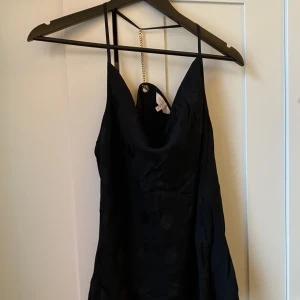 Black cami from Ted Baker - Selling this cute cami with chains details in the back from Ted Baker, never worn it