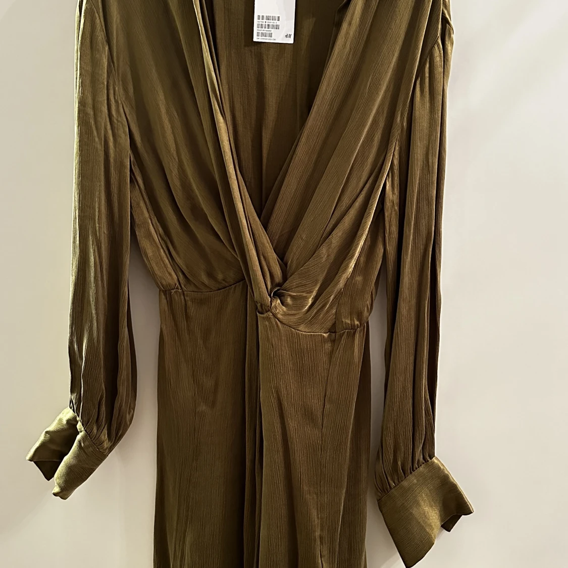 Oanvänd kort klänning