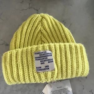 Mössa Baum und Pferdgarten - Oanvänd mössa från Baum und Pferdgarten. 