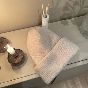 Beige mössa i ull - Köpt på Åhléns, fin beige färg🤎
