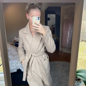 Beige kappa - Beige kappa i fint skick