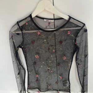 Blommig meshtopp - Meshtopp