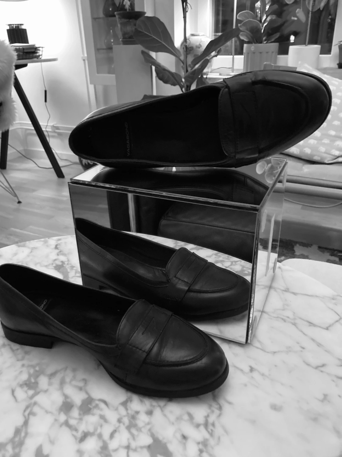 Svarta loafers