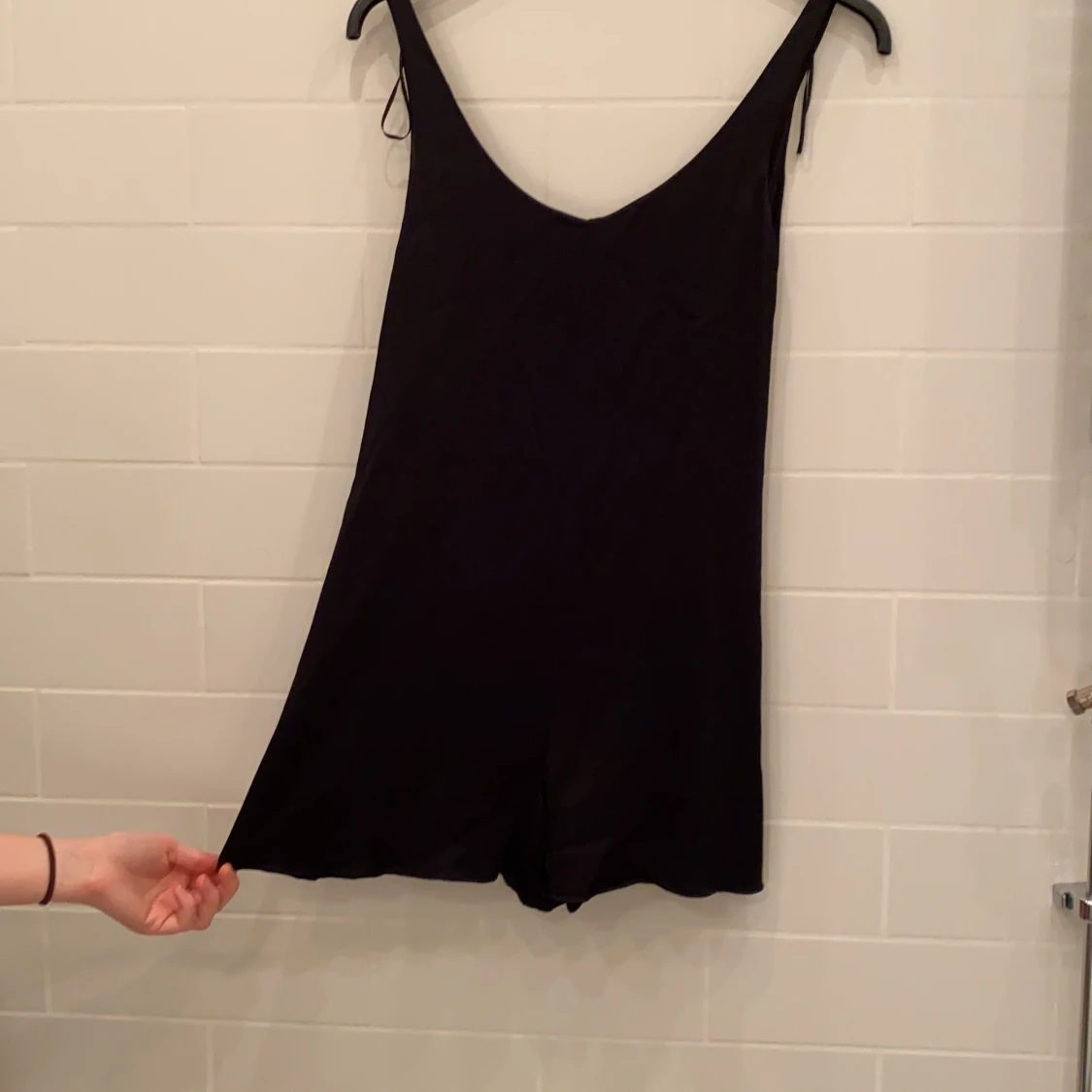 Svart romper med spets detaljer i ryggen - 90