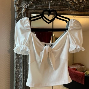 Romantic Top - White stretchy top with sweetheart neckline and poufy sleeves. Disclaimer: XS tight sleeves