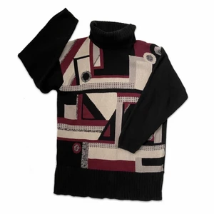 Polotröja  - Stickad polotröja med coolt mönster  Super mysigt o oversized Har även en lite slits längst ner på vardera sida Är i super bra skick