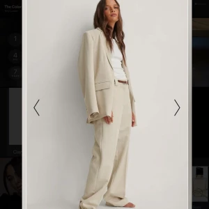 Kostymset NAKD - Beiget kostymset från nakd. Strl 40 på både kavaj och byxor. 