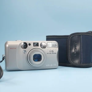 Filmkamera Minolta riva zoom 115  - Filmkamera som fungerar utmärkt, bra bild och har använts av en ägare. 