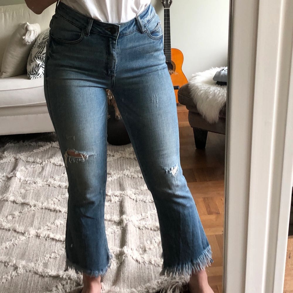 Jeans med fransar
