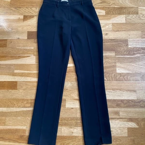 Kostymbyxor - Kostymbyxor från spanskt märke Punto Roma i storlek 38. Lätt utsvängda. Använda men i bra skick