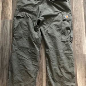 Carhartt Cargobyxor - Carhartt Cargobyxor, 34/32 baggy passform, skriv privat för fler bilder! Tar bud