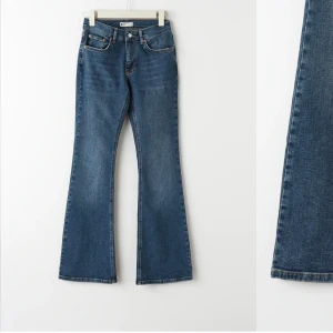 Lågmidjade jeans  - Mörkblåa lågmidjade jeans från Gina tricot