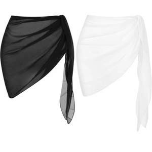 Två helt oanvända bikini saronger. Köp 1 för 79kr eller båda för 120kr (Svart är såld)
