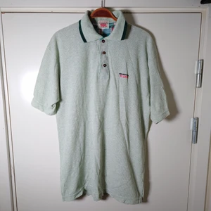 Levi's pike - En äkta vintage Levi's piketröja, färgen är väldigt ljus turkos. Ingen storleksmärkning men är som en L🌱