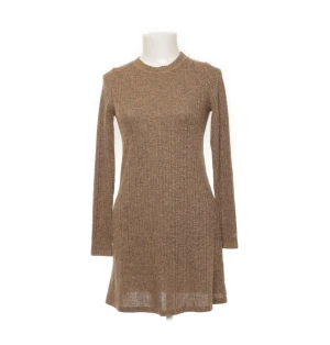 Stickad klänning från Topshop - Stickad klänning från topshop.