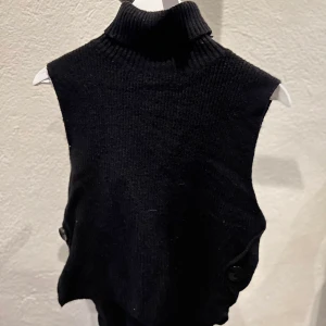 Polo Kofta  - Kofta utan ärmar. Polo 