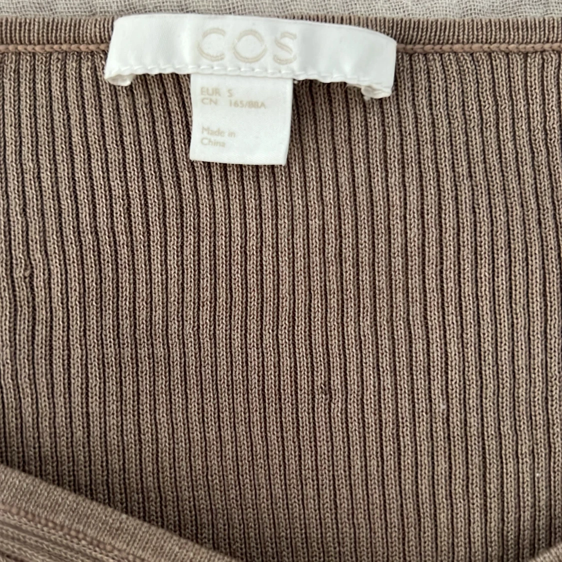 Långarmad top från COS - 91