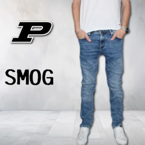 Jeans  - Väldigt stilrena och sköna jeans i stretch från SMOG! - Stl 29/32.
