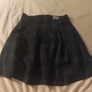 School girl skirt - School girl skirt. Black and green. Puffy.