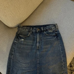 Jeanskjol  - Varsamt använd 