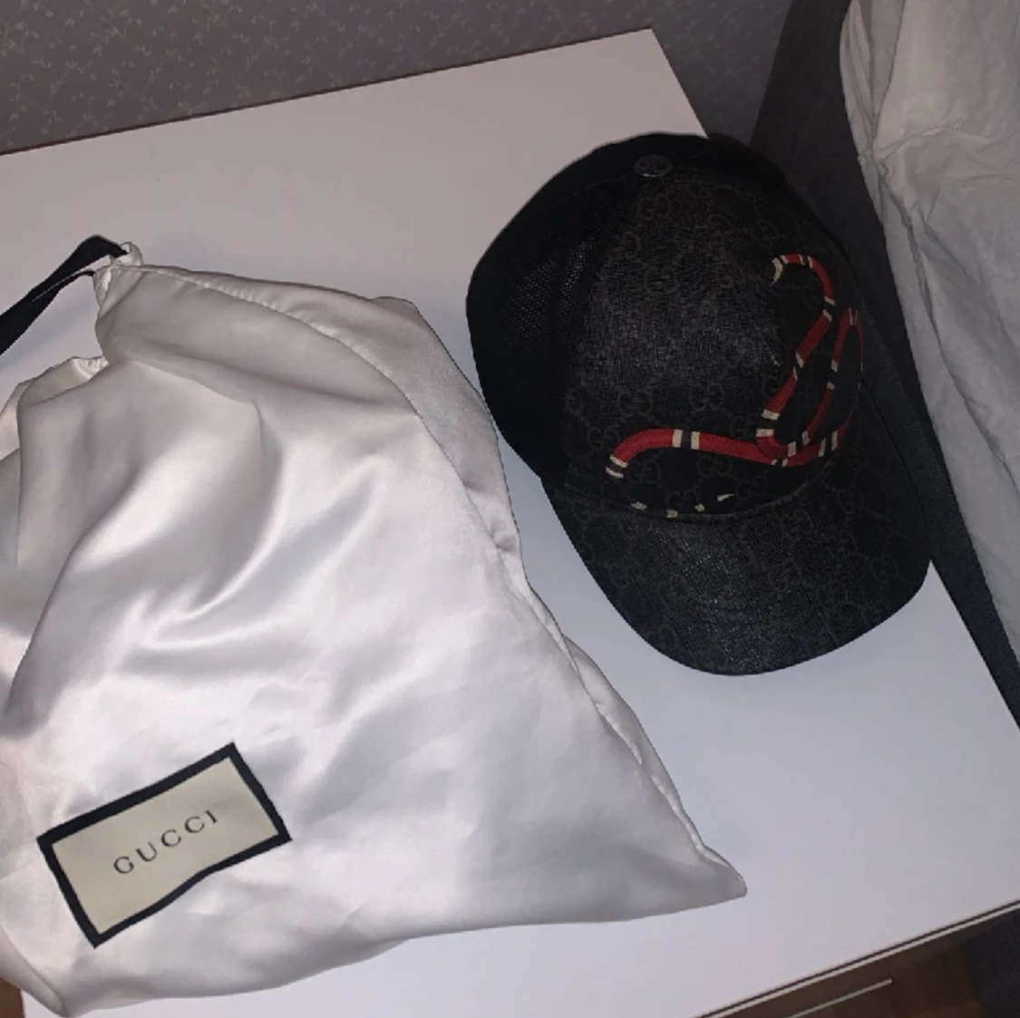 Gucci snake keps äkta