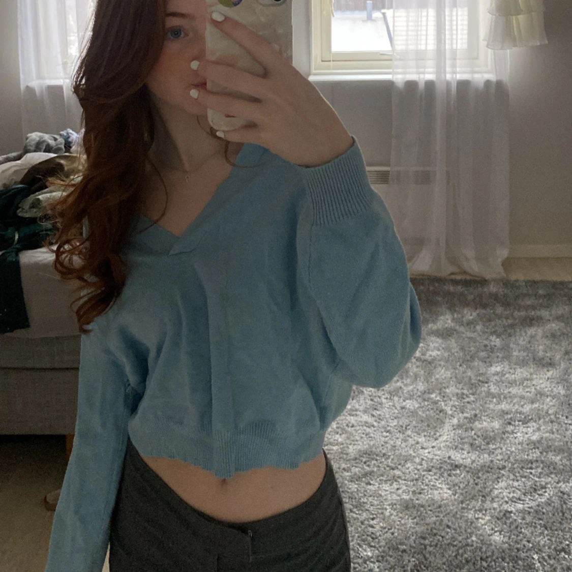 Blå kofta med krage