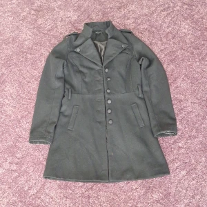 Vila kappa svart - Vila kappa svart helt ny.