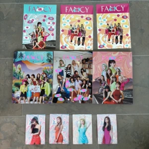 Twice Fancy You Album set  - Set includes versions A, B & C + inclusions. The set also comes with special holographic photo cards (Momo , Sana , Dahyun, Tzuyu)  Condition: Used good 