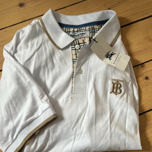 Burberry piké - Inte äkta, aldrig använd. 
