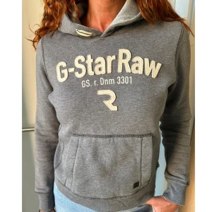 Grå hoodie G-star  - Grå hoodie från G-star i stl M (mer som en S). Fint skick!