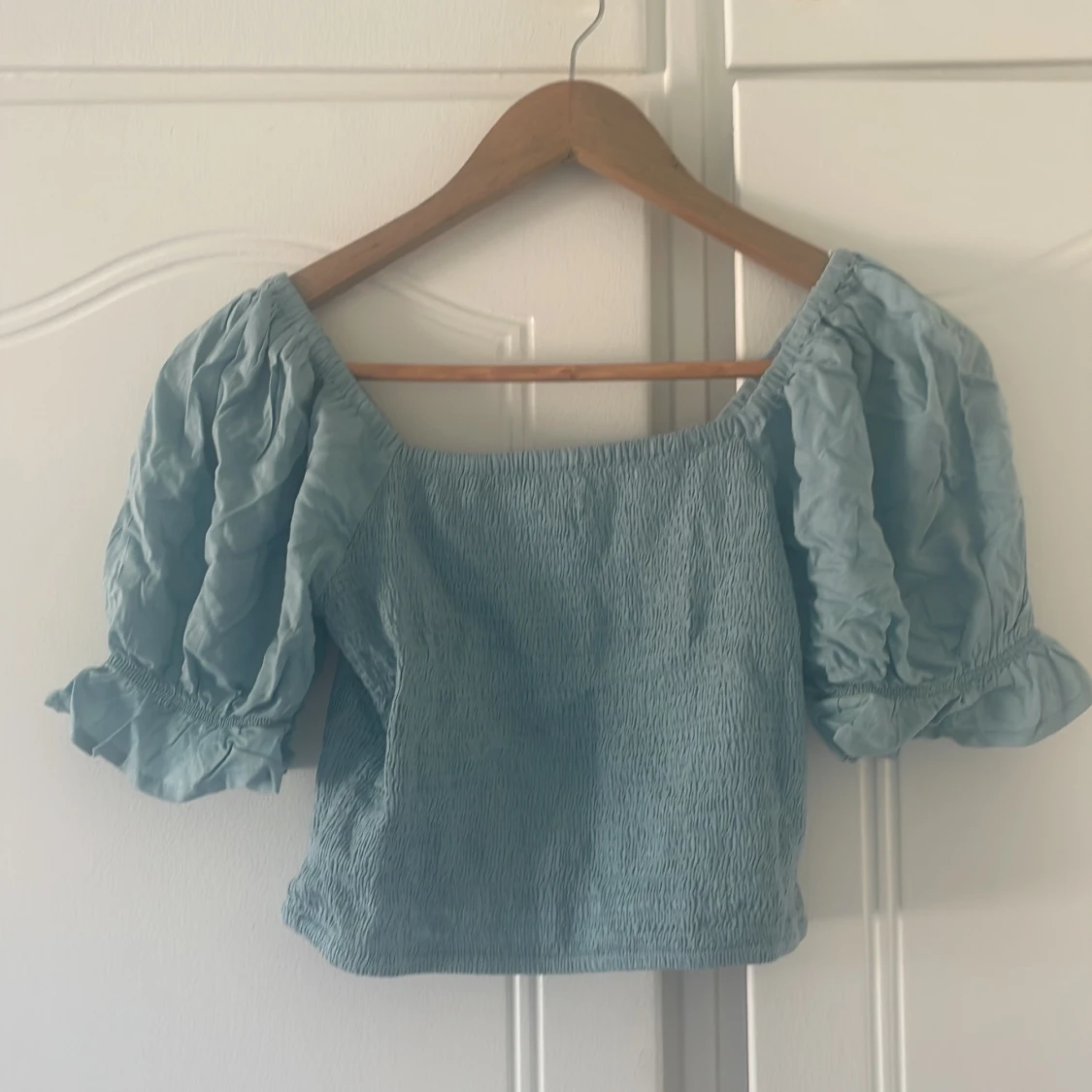 Blå tröja med volanger - 90