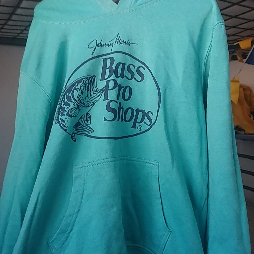 It is a turwoise and green mixed hoodie for 8 to 9 year old boys. It is used but not that much. Prices can be lower if interested. Hoodies.
