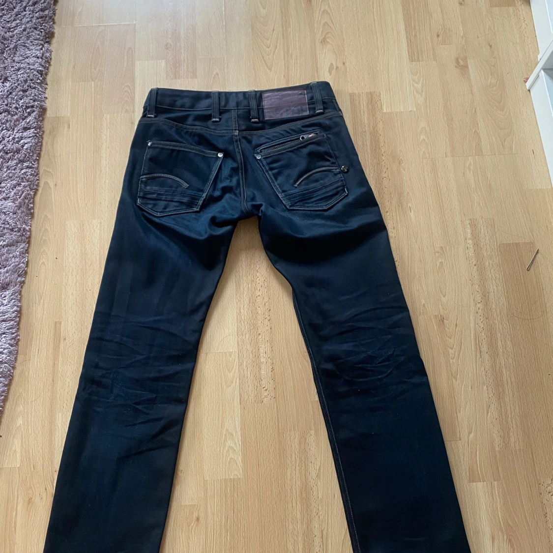 Blåa G-Star jeans   - 90