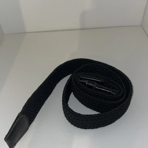 Flätad bälte - Flätad bälte använd mycket men sparsamt 