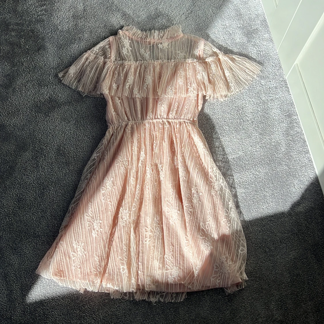 Rosa blommig klänning