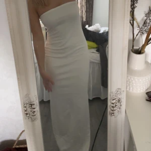 Tub klänning - Helt ny tub topp klänning köpt från NA-KD. Pstislappen sitter kvar!