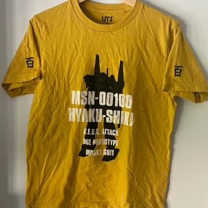 Gundam Mecha Tee - Gundam x Uniqlo Mecha 40yr Anniversary tee with prints on front and both arms
