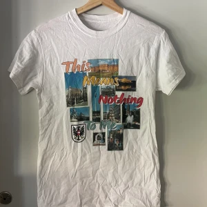 This Means Nothing To Me Tee - White tee with cool print and text reading 'This Means Nothing To Me'